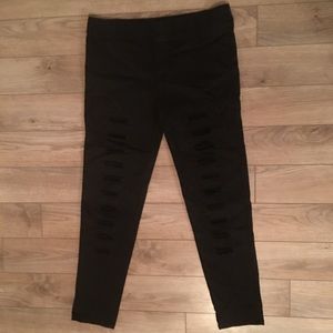 Black distressed moto jeggings